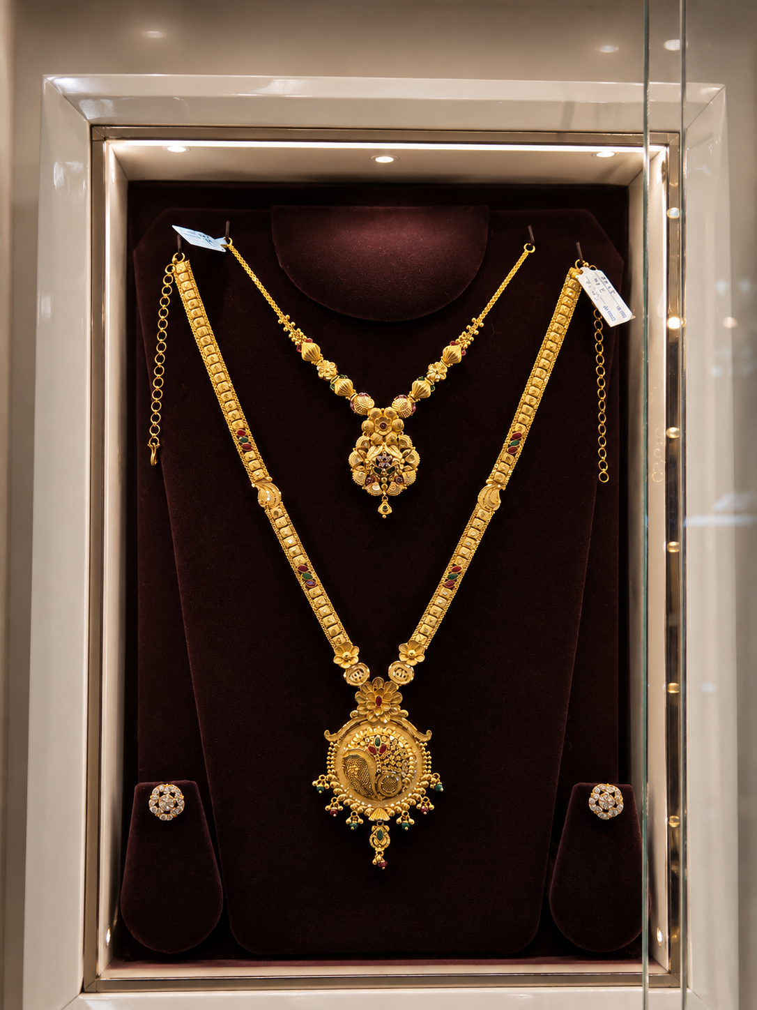 Gold necklace and long haram set with matching studs