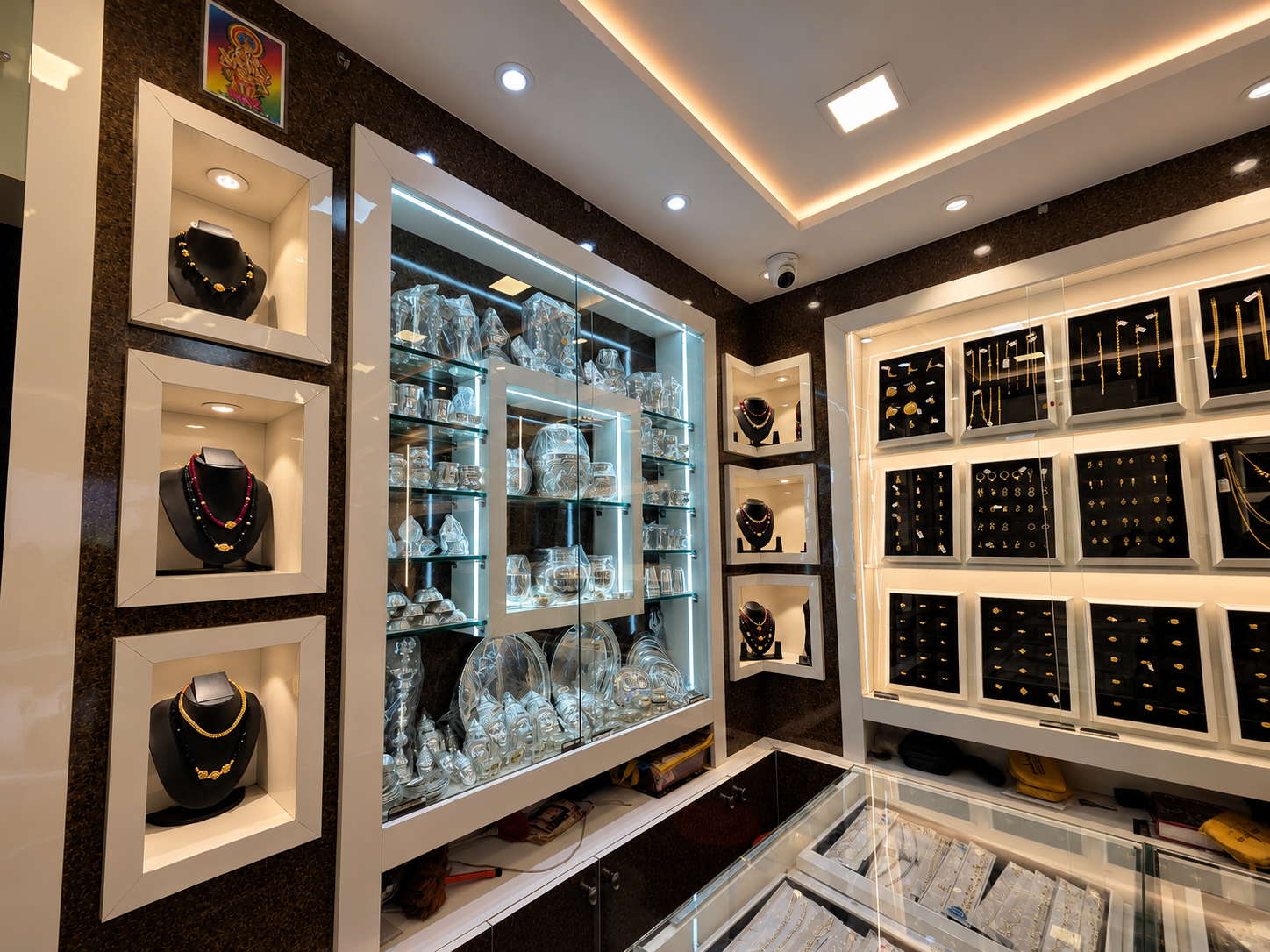 Gold, silver and diamond displays inside the Sapthagiri showroom